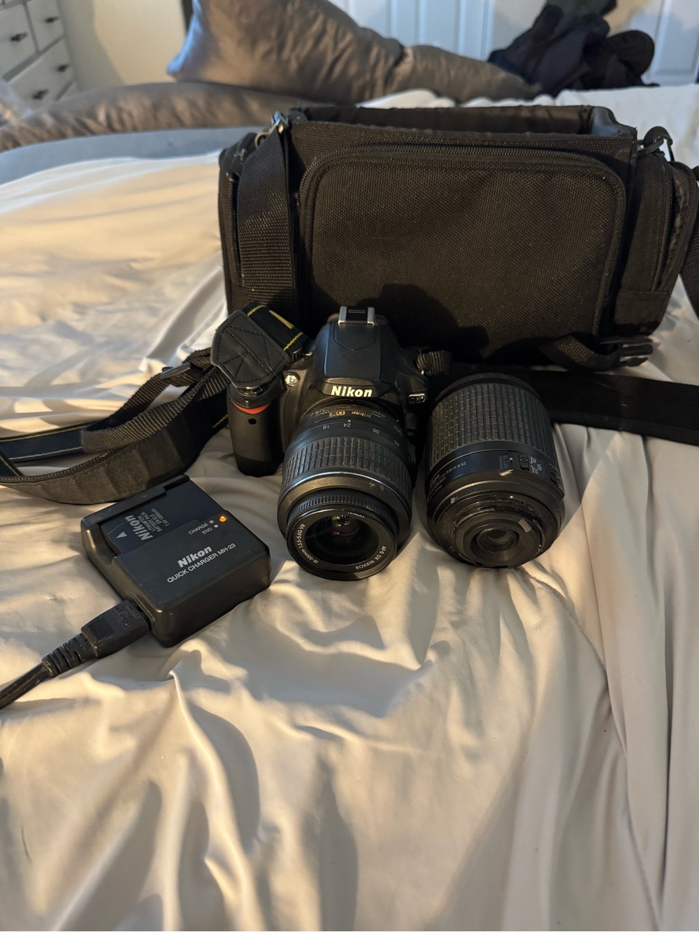 Nikon Black DSLR with Two Lenses and Charger